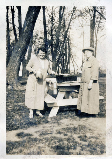 Friend and Bertha cooking